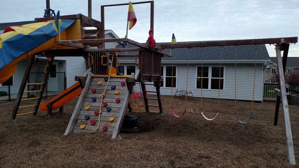 Wood playset before a complete cleaning process by One-80 Woodcare Rochester Mn